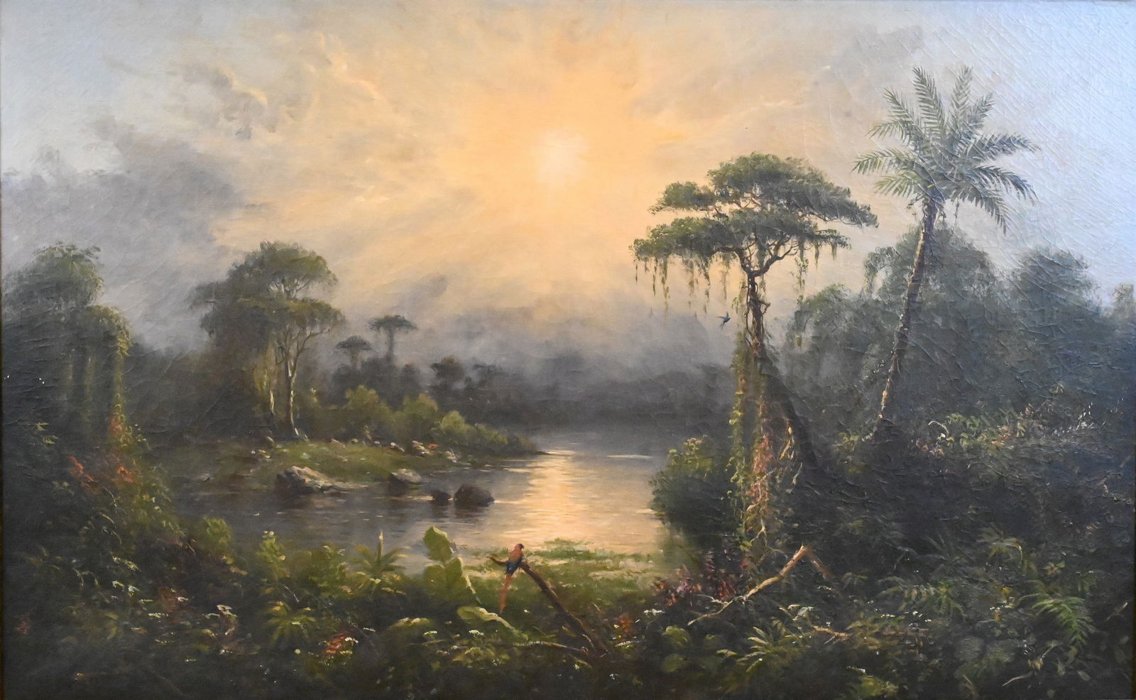 School of Frederic Edwin Church (American 1826-1900): School of Frederic Edwin Church (American 1826-1900) “Tropical Sunrise over a River Valley” Lush and atmospheric tropical landscape depicting a radiant sunrise flooding the sky with gold a