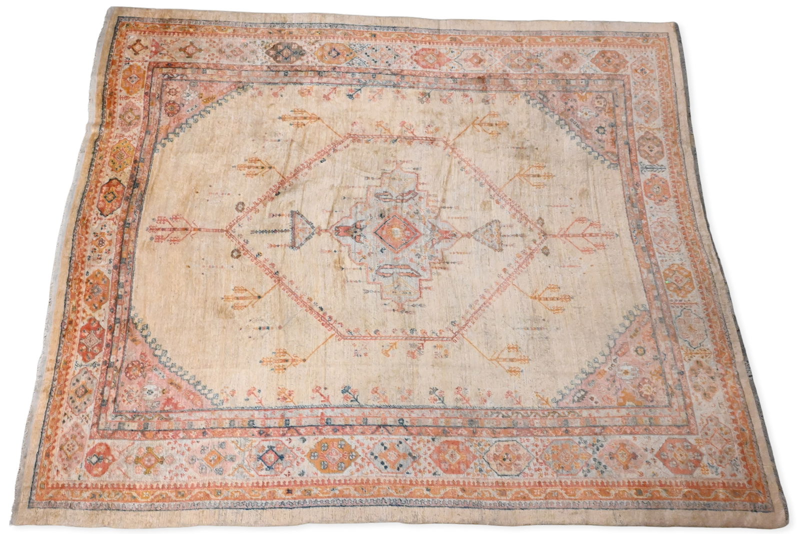 Angora Oushak Carpet: Angora Oushak Carpet room-size Oushak carpet with a soft ivory field decorated with open geometric medallions and stylized leafy motifs in muted terracotta, apricot, and celadon tones, framed by multi