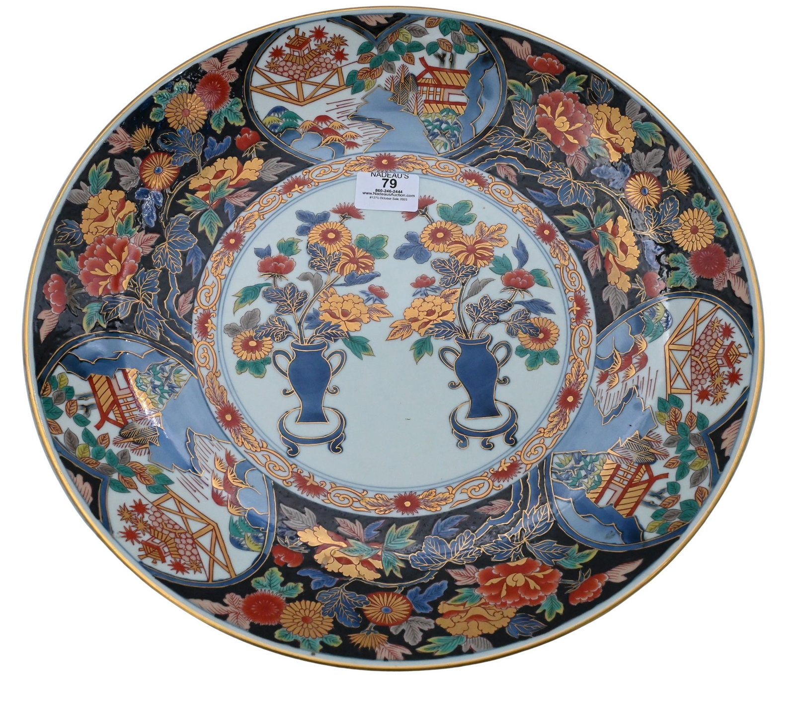 Japanese Arita Imari Charger: Japanese Arita Imari Charger featuring pair of flowering urns center motif, character marks to underside diameter 15 1/2 inches