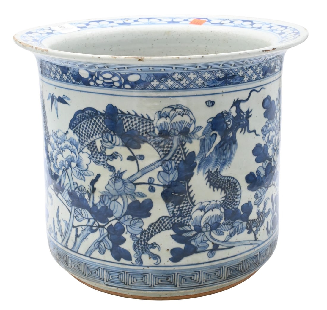 Large Chinese Blue and White Dragon Jardiniere: Large Chinese Blue and White Dragon Jardiniere of cylindrical form with flared rim, having four clawed dragon amongst flower and vine motif, drainage hole to bottom height 11 1/2 inches, diameter 14 i