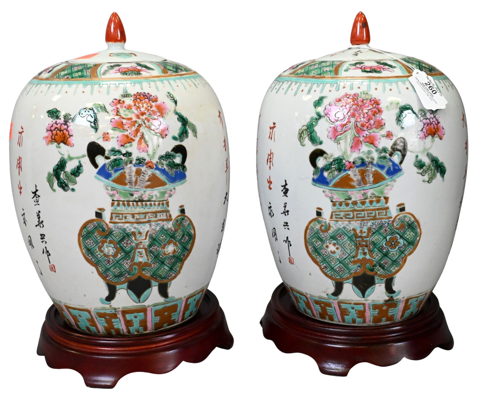 Pair of Chinese Famille Rose Covered Ginger Jars: Pair of Chinese Famille Rose Covered Ginger Jars both having bonsai tree in ceremonial vessel motif, on carved pedestal bases height 12 inches Provenance: Property from a Prominent New York City Colle