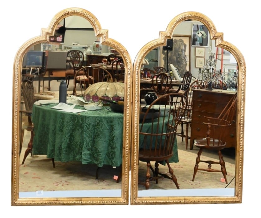 Pair of Arched Giltwood Mirrors: Pair of Arched Giltwood Mirrors having carved and beveled frame 43" x 26" Provenance: From an Upper East Side, Fifth Avenue Apartment