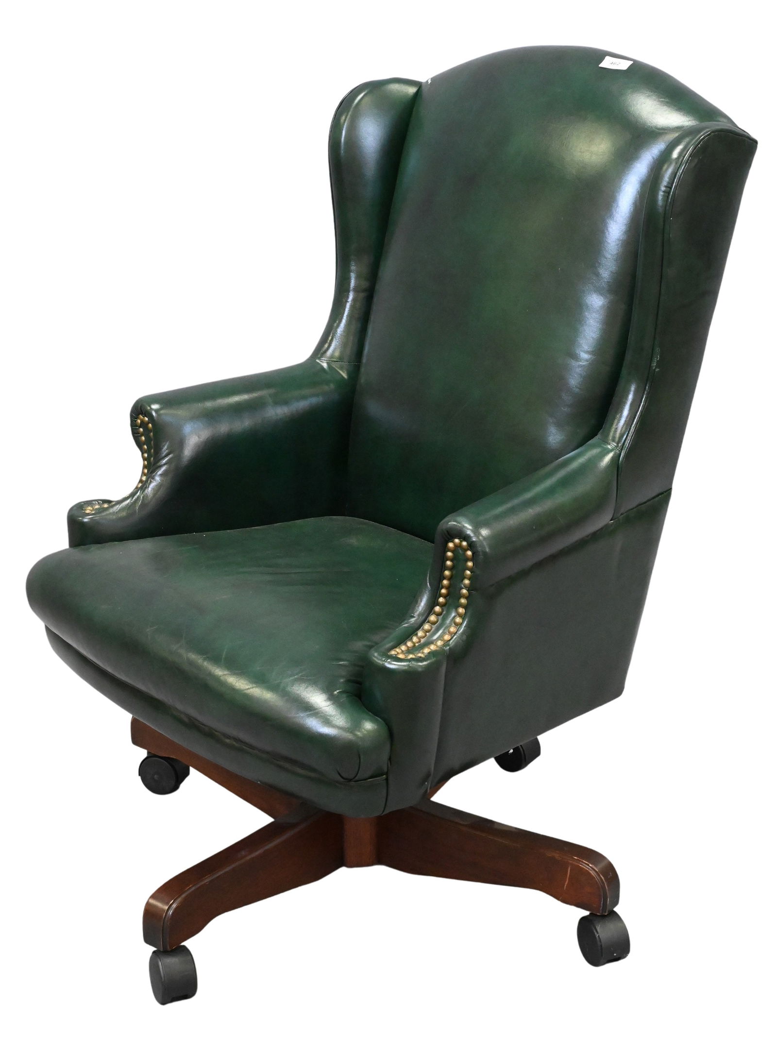 Green Leather Upholstered Swivel Office Chair: Green Leather Upholstered Swivel Office Chair height 42 inches, width 28 inches