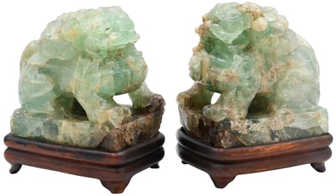 Pair of Chinese Carved Green Quartz Foo Dogs