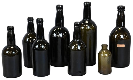 Group of Eight Dark Olive-Green Glass Bottles, 18th / 19th Century