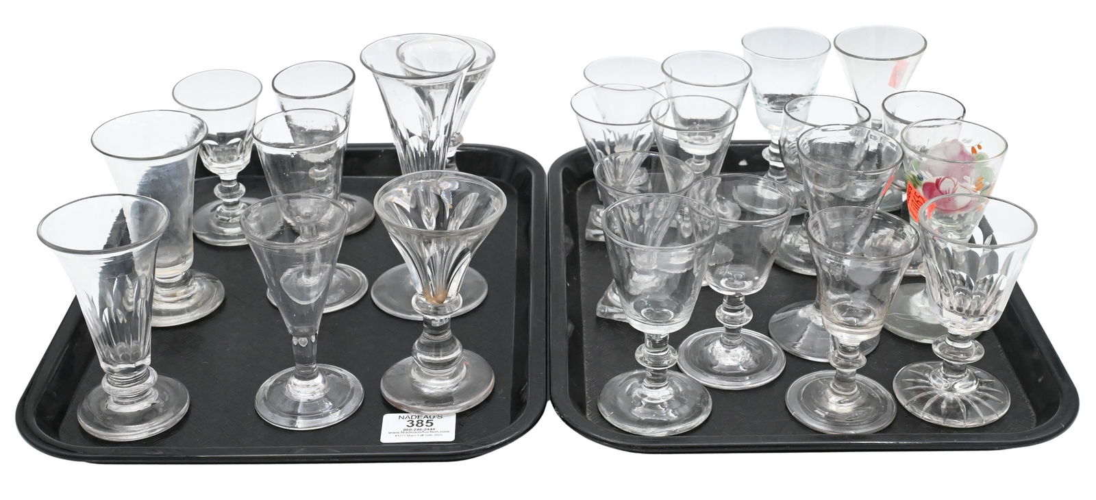 Group of Early Blown Glass Stemware: Group of Early Blown Glass Stemware 18th/19th Century A collection of 24 clear blown glass stemware pieces, including flared wine glasses, cordials, and goblets in various forms, some with folded feet