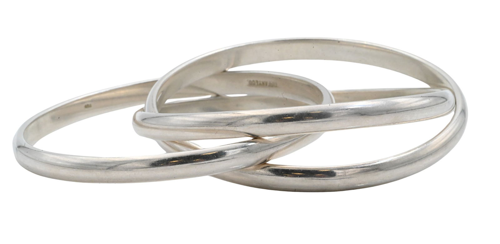 Tiffany & Co. Sterling Silver Rolling Bangle Bracelet: Tiffany & Co. Sterling Silver Rolling Bangle Bracelet composed of three interlocking bands, each stamped Tiffany & Co. and 925, total weight 3.24 troy ounces.