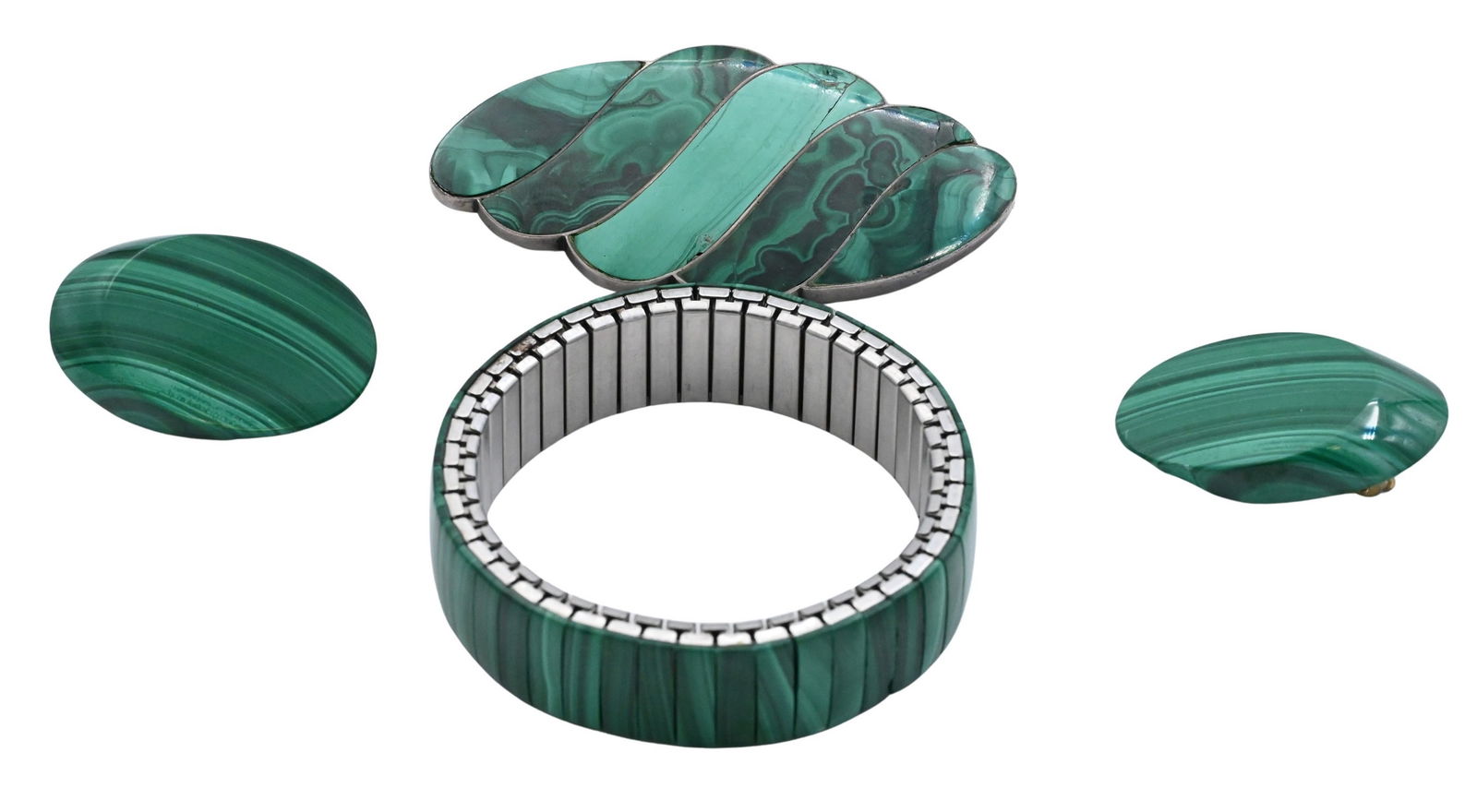 Group of Malachite Jewelry: Group of Malachite Jewelry Including a sterling silver malachite brooch (3 inches long), a pair of oval malachite clip earrings (1 inch long), and a stretch bracelet inset with malachite panels (2 