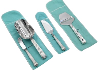 Four Pieces of Tiffany and Co. Weighted Sterling Silver Serving Utensils