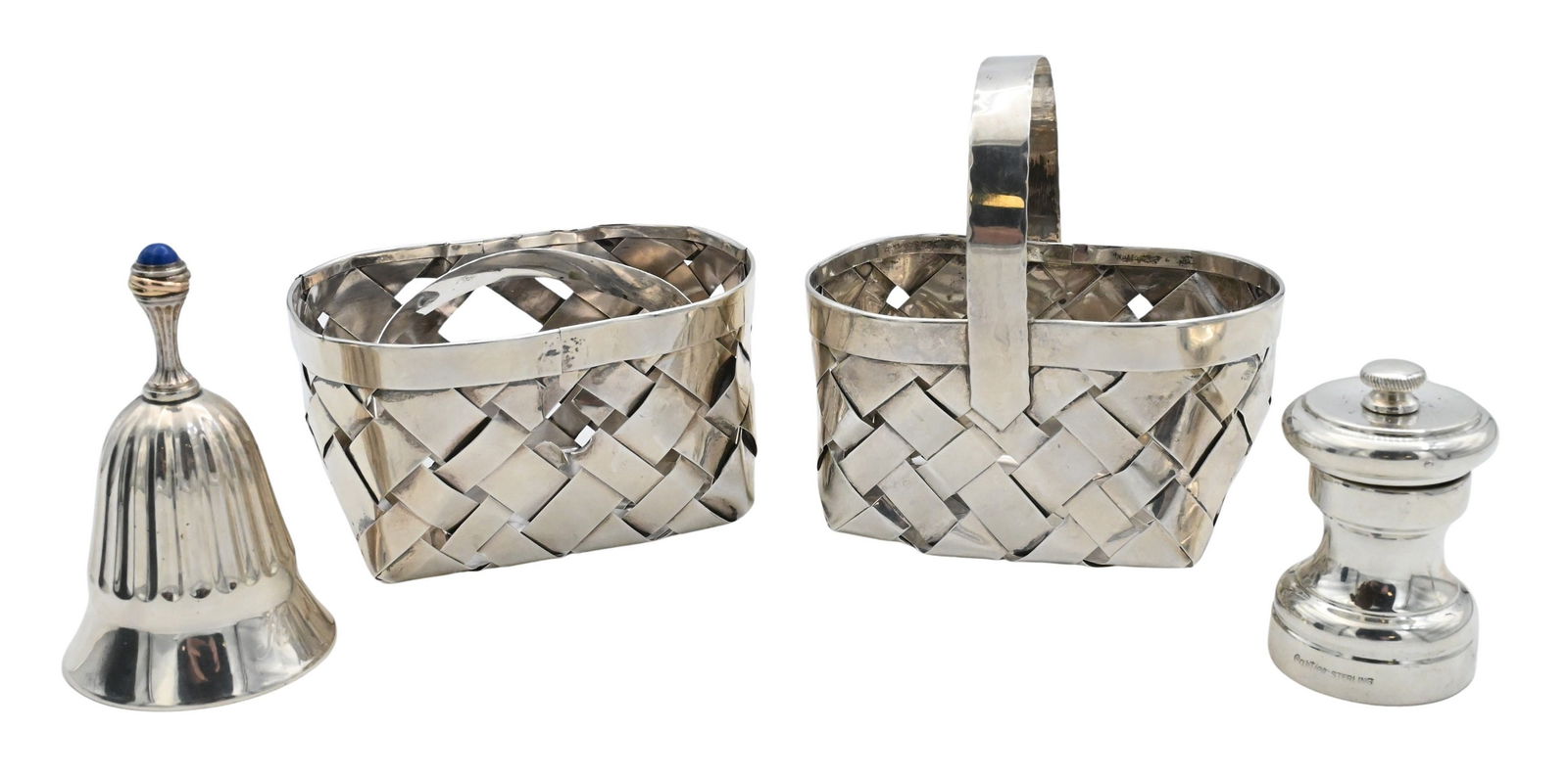 Four Piece Group of Cartier Sterling Silver Table Accessories: Four Piece Group of Cartier Sterling Silver Table Accessories Including a pair of hand-woven sterling silver baskets, each marked Cartier Handmade Sterling (one handle detached); a fluted bell with la