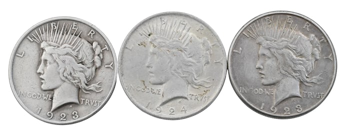 Three $1.00 90% Silver Peace Dollars