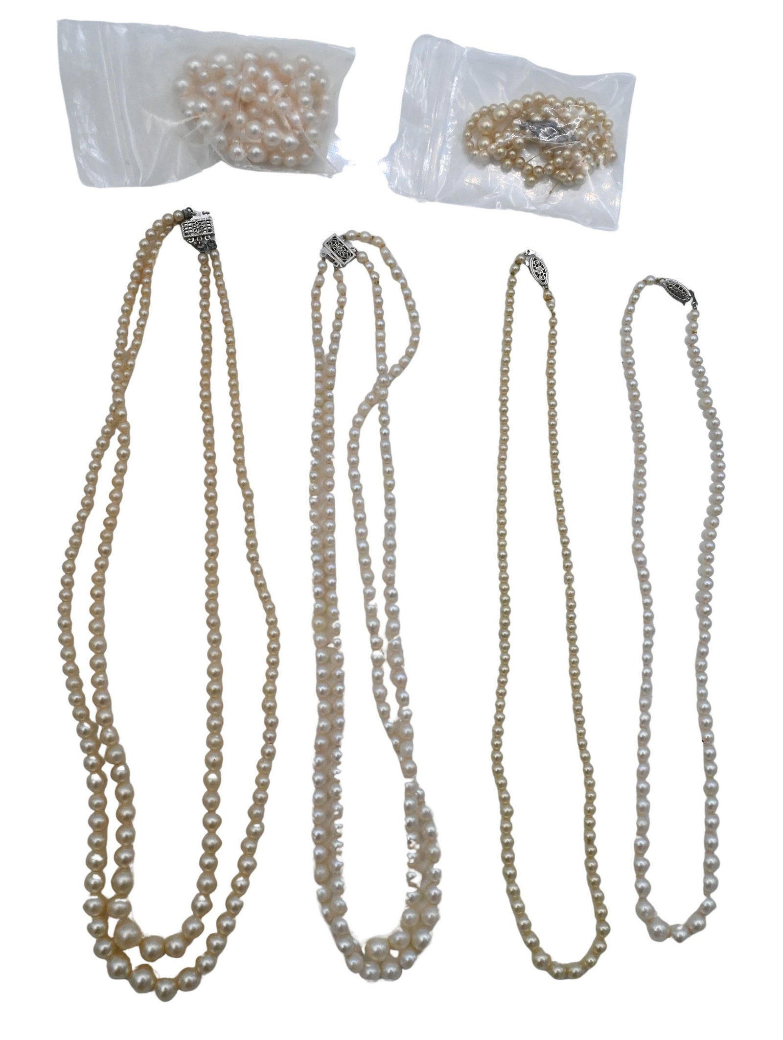 Six Strands of Pearls: Six Strands of Pearls most with 10k gold clasp, and two without clasp, longest 17 inches