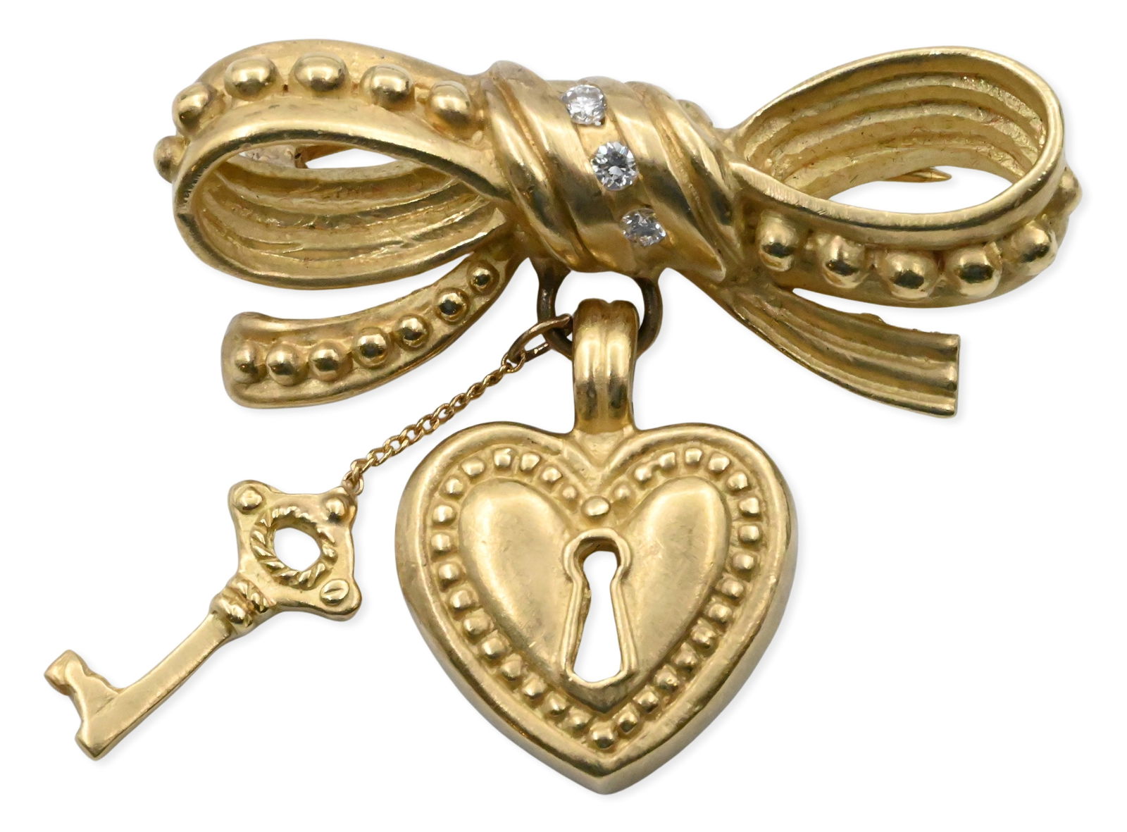 18K Yellow Gold Brooch Designed as a Bow Suspending a Heart-shaped Padlock with Keyhole and a Dangli (1 of 5)