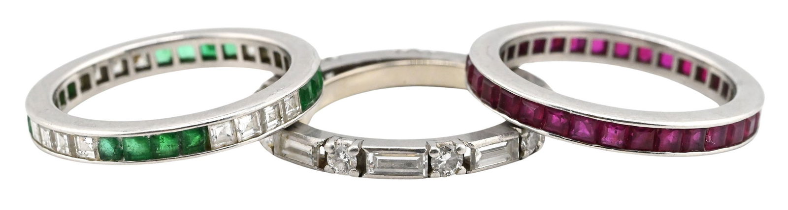 Diamond, Emerald, and Ruby Eternity Rings: Diamond, Emerald, and Ruby Eternity Rings Comprising three finely crafted platinum eternity bands: one channel-set with square-cut emeralds, size 6, one channel-set with square-cut rubies, size 6, one