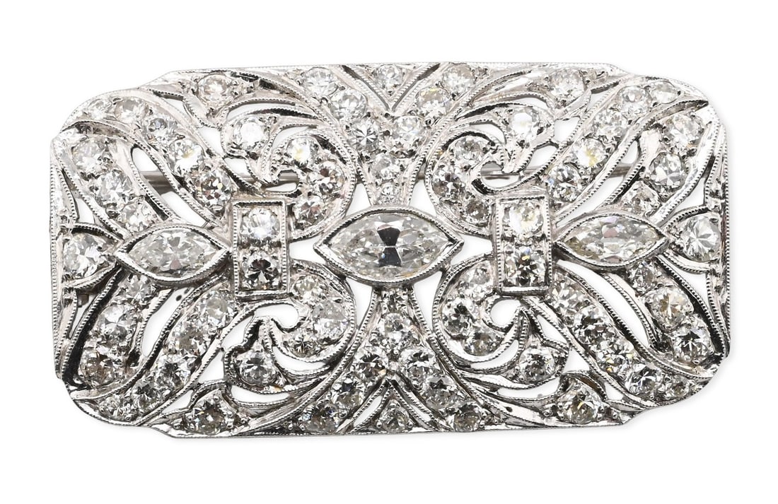 Platinum Openwork Rectangular Brooch - Pendant of Pierced Design: Platinum Openwork Rectangular Brooch - Pendant of Pierced Design centering three marquise-shaped collet-set natural diamonds weighing approximately 0.80 carats surrounded by seventy-four old European 