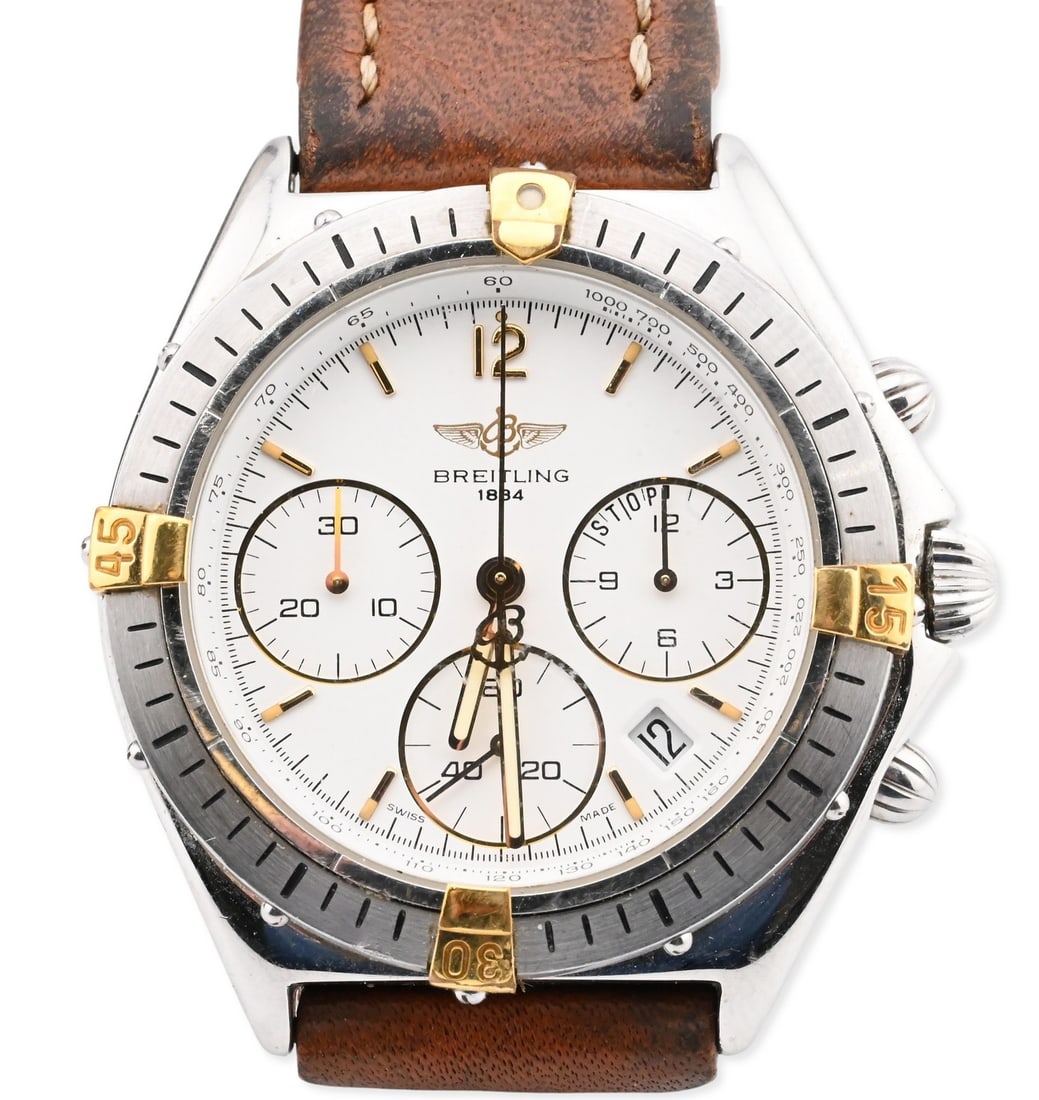 Breitling Stainless Steel and Gold Tone Chronograph Wristwatch: Breitling Stainless Steel and Gold Tone Chronograph Wristwatch Reference number B55045, quartz chronograph movement with 12-hour and 30-minute registers and constant seconds, white dial with applied g