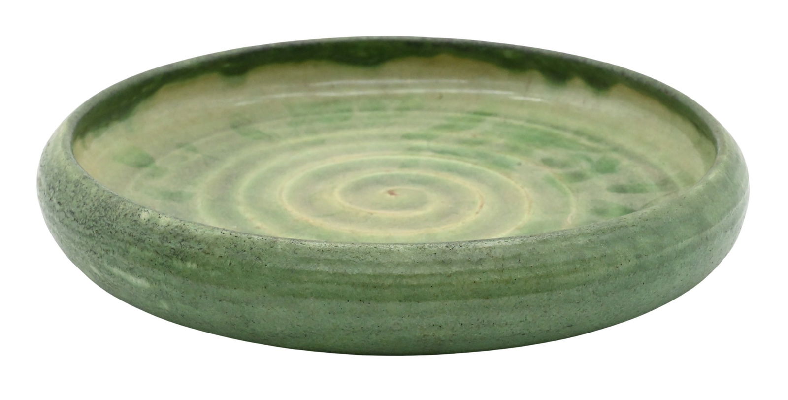 Grueby Pottery Shallow Bowl: Grueby Pottery Shallow Bowl matte green glaze, interior having swirl decoration impressed, marked on bottom diameter 10 inches