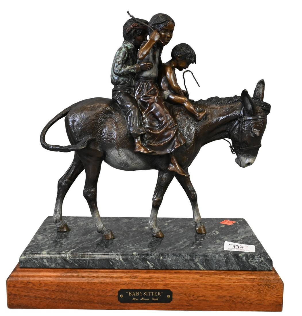 Star Liana York (American B.1949): Star Liana York (American B.1949) "The Babysitter" Cast and patinated bronze sculpture, edition 2/35 Signed and titled on plaque Height 14 inches Provenance: Part of a large Western art