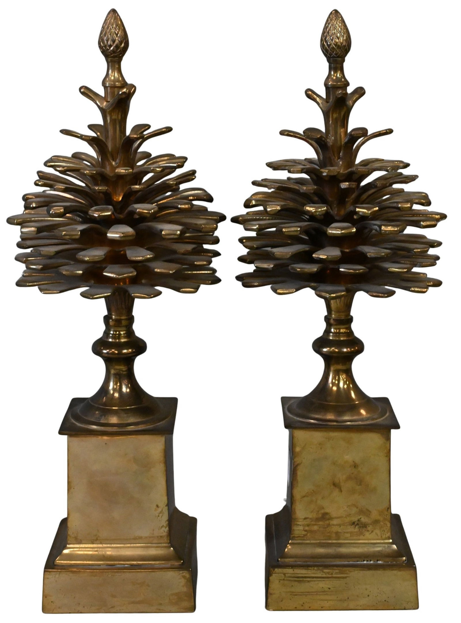 Pair of Mottahedeh Brass "Pommes de Pin" Pinecones in the Style of Maison Charles: Pair of Mottahedeh Brass "Pommes de Pin" in the Style of Maison Charles each garniture having detailed, weighty pinecone atop a square stepped brass base, surmounted by acorn-shaped finial, marked