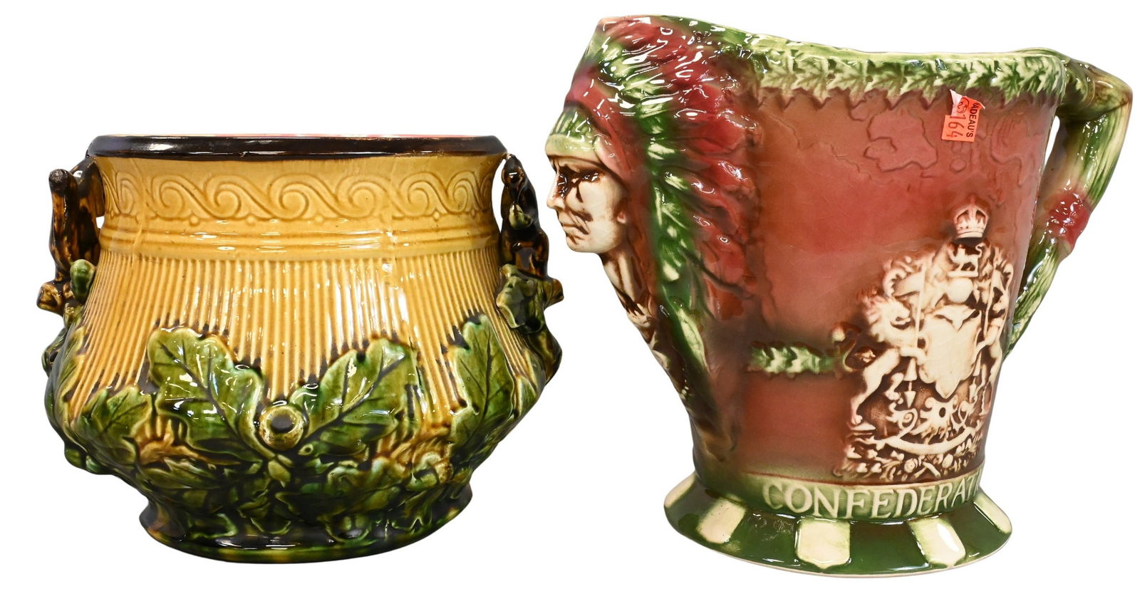 Two Piece Majolica Group: Two Piece Majolica Group to include Carlton Ware Confederation of Canada Pitcher with Native American chief spout, height 10 inches, along with squirrel and oak leaf jardiniere, height 8 inches 