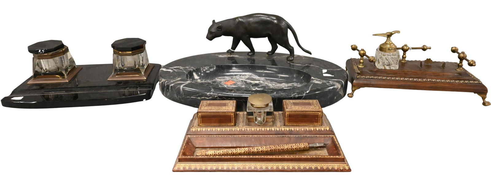 Four Piece Inkwell Group: Four Piece Inkwell Group to include to include one set on black glass, length 12 inches, one with marble tray and bronze jaguar or leopard cat length 17 inches, Victorian oak and brass-mounted