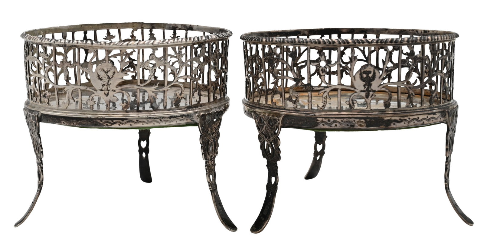 Pair of Georgian Sterling Silver Wine Coasters, Attributed to Francis Spilsbury II: Pair of Georgian Sterling Silver Wine Coasters, Attributed to Francis Spilsbury II each of circular form having pierced foliate and floral decoration, centered by cartouche featuring double-headed eag