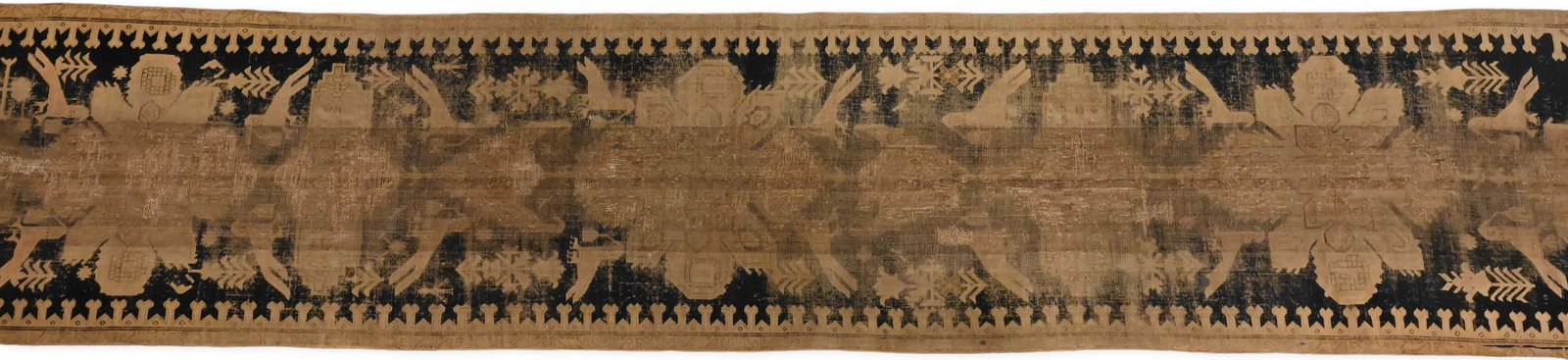 Caucasian Runner: Caucasian Runner 18th/19th Century dark brown to near-black field centering ivory geometric medallions flanked by stylized birds, trees, and latch-hook motifs, all in a reciprocal border, reduced