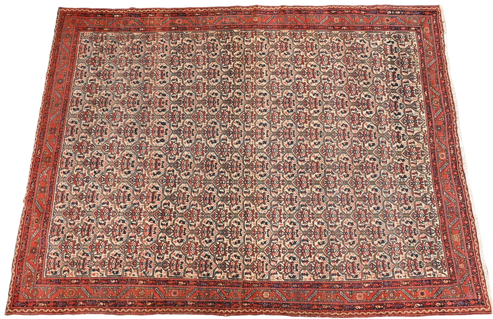 Serabend Carpet: Serabend Carpet stylized leaf decoration in cream on a claret ground flanked by floral and geometric borders in claret, dark blue and cream, West Persia, 20th century 6' 2" x 8' Provenance: Property o
