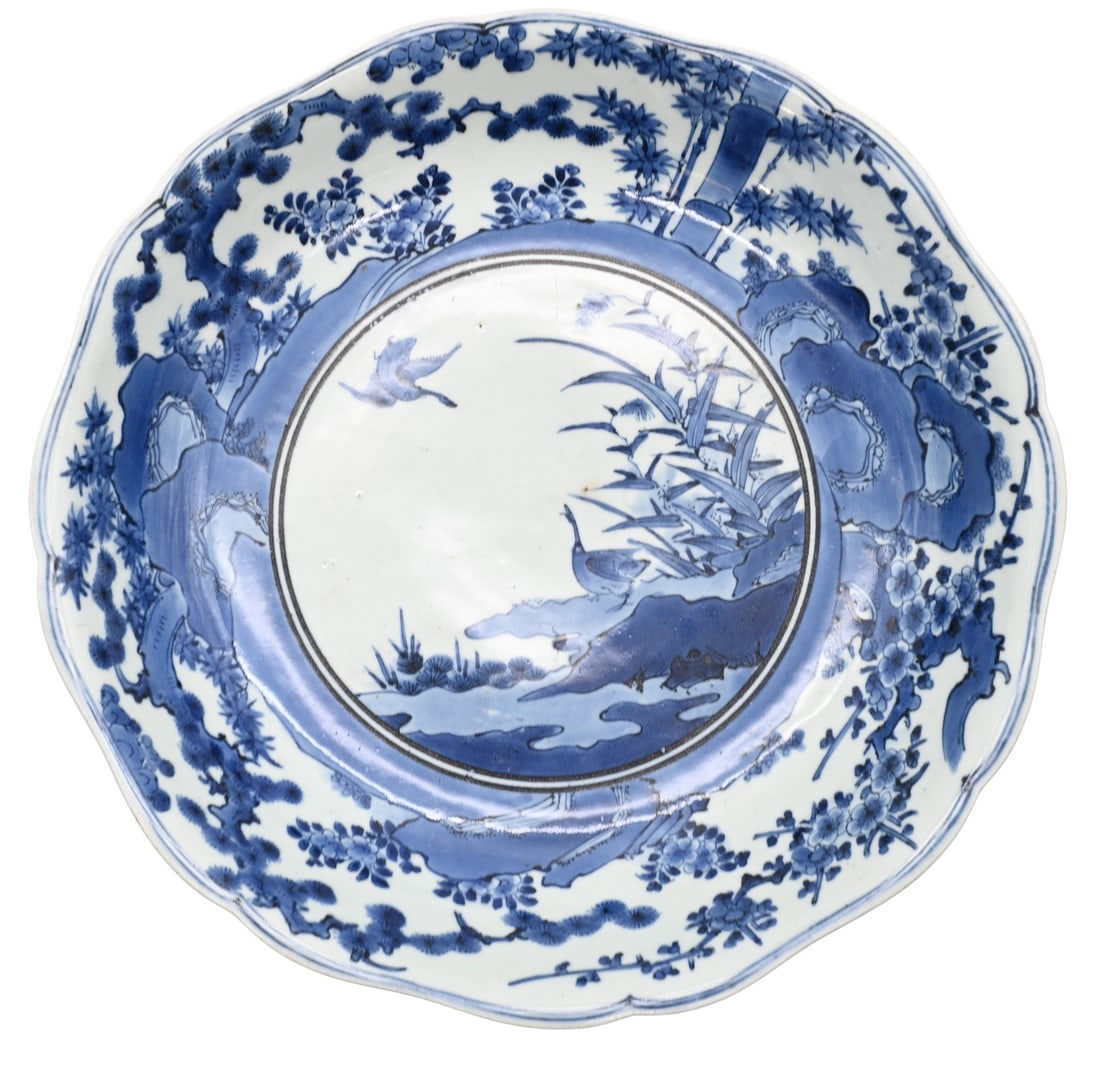 Japanese Edo Period Blue and White Porcelain Lobed Dish: Japanese Edo Period Blue and White Porcelain Lobed Dish the large circular dish having lobed rim, decorated in underglaze blue enamels, the center featuring a roundel depicting two ducks on a riverban
