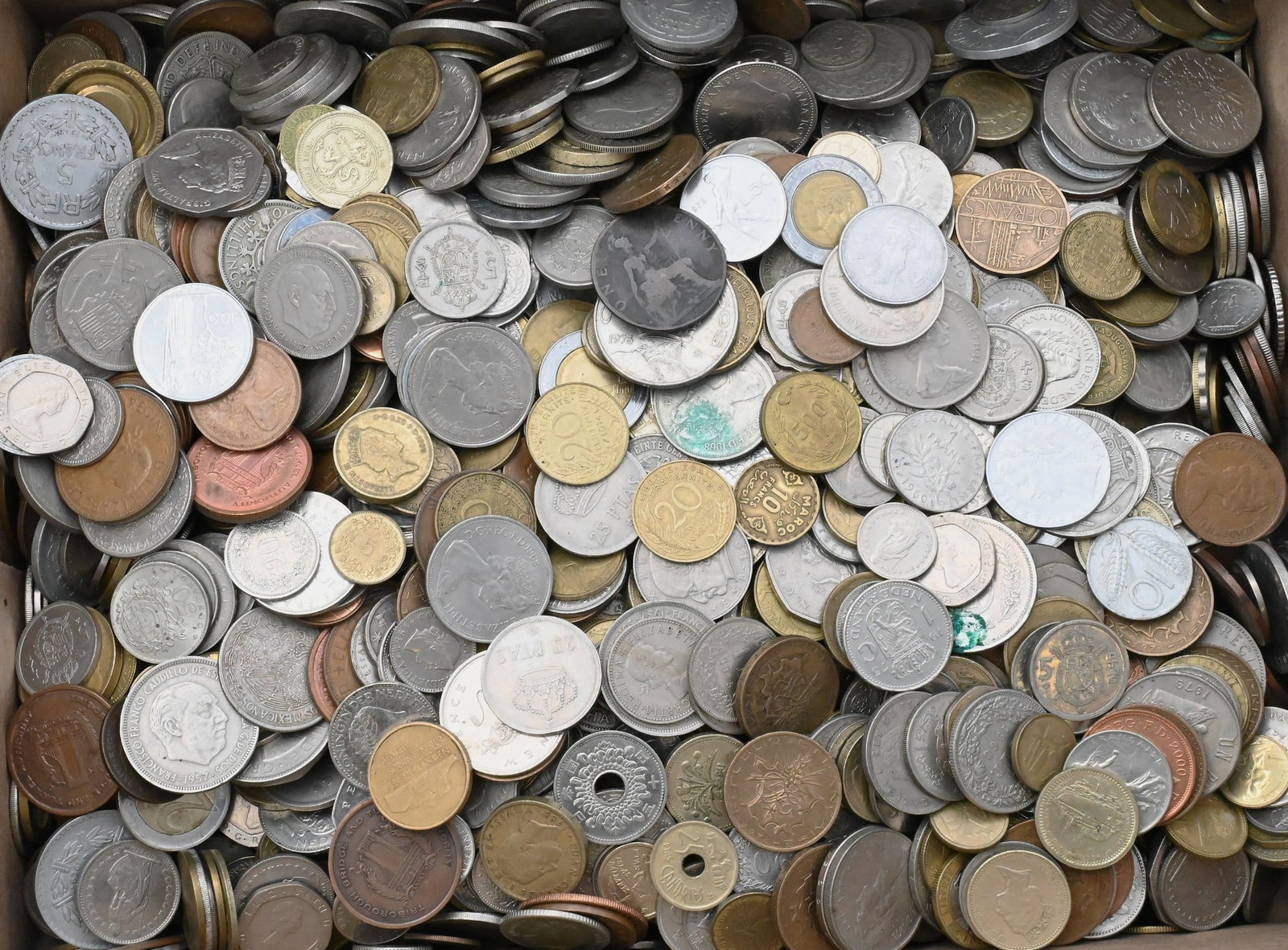 Box Lot of Various Foreign Coins: Box Lot of Various Foreign Coins possibly including some silver