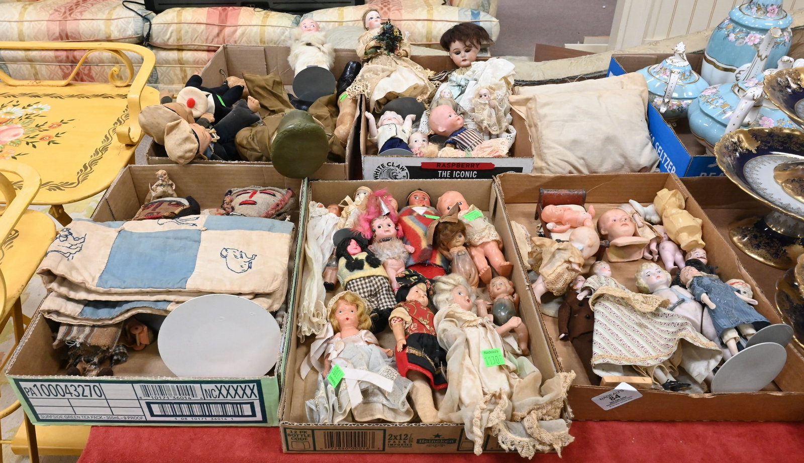 Six Box Lots of German Bisque and Vintage Dolls: Six Box Lots of German Bisque and Vintage Dolls to include examples with molded and painted hair, glass sleep eyes, and jointed composition bodies. Several smaller dolls including googly-eye types,