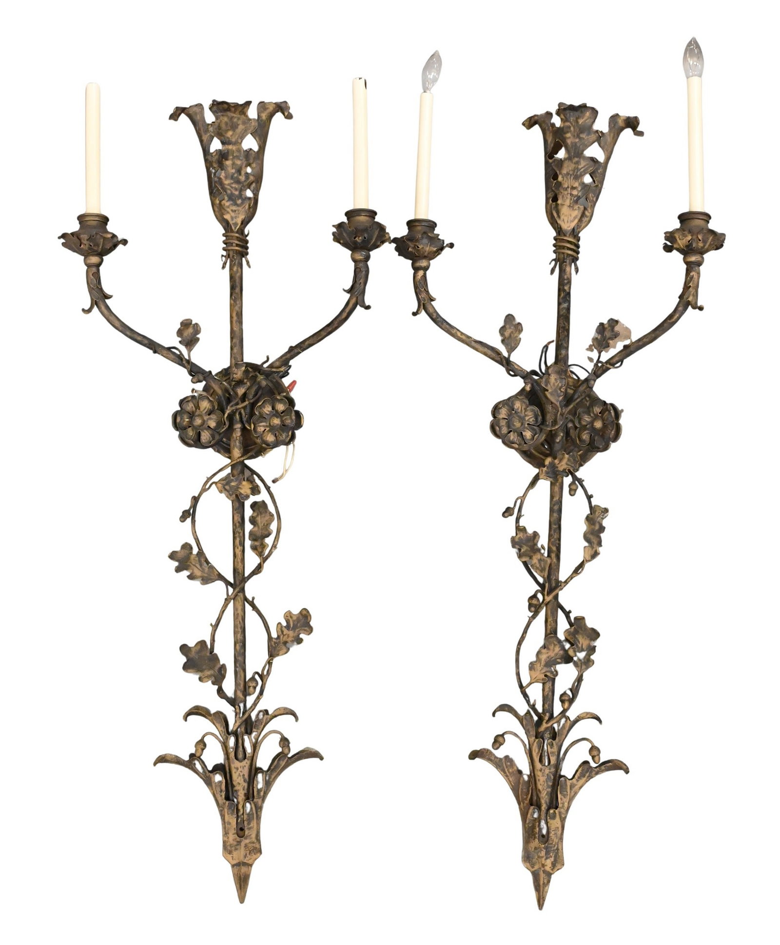Pair of Monumental Cast-Metal Oak Leaf and Acorn Wall Sconces: Pair of Monumental Cast-Metal Oak Leaf and Acorn Wall Sconces each elongated backplate cast in bold relief with naturalistic oak leaves and acorns, issuing three scrolling candle arms with