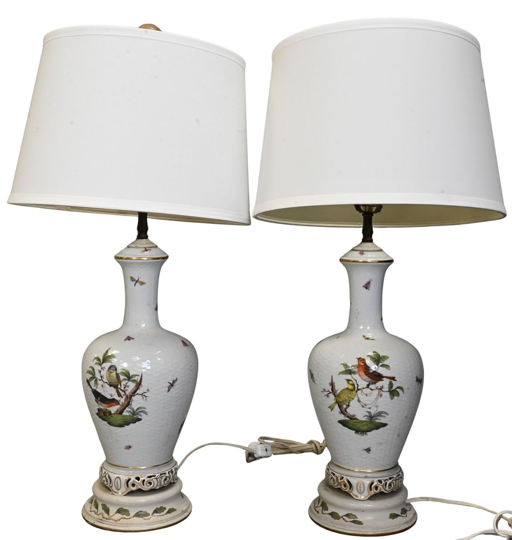 Pair of Herend Rothschild Bird Porcelain Table Lamps: Pair of Herend Rothschild Bird Porcelain Table Lamps Features a white glazed basket, with colorful butterflies and birds (repairs) vase height 12 inches, total height 25 inches