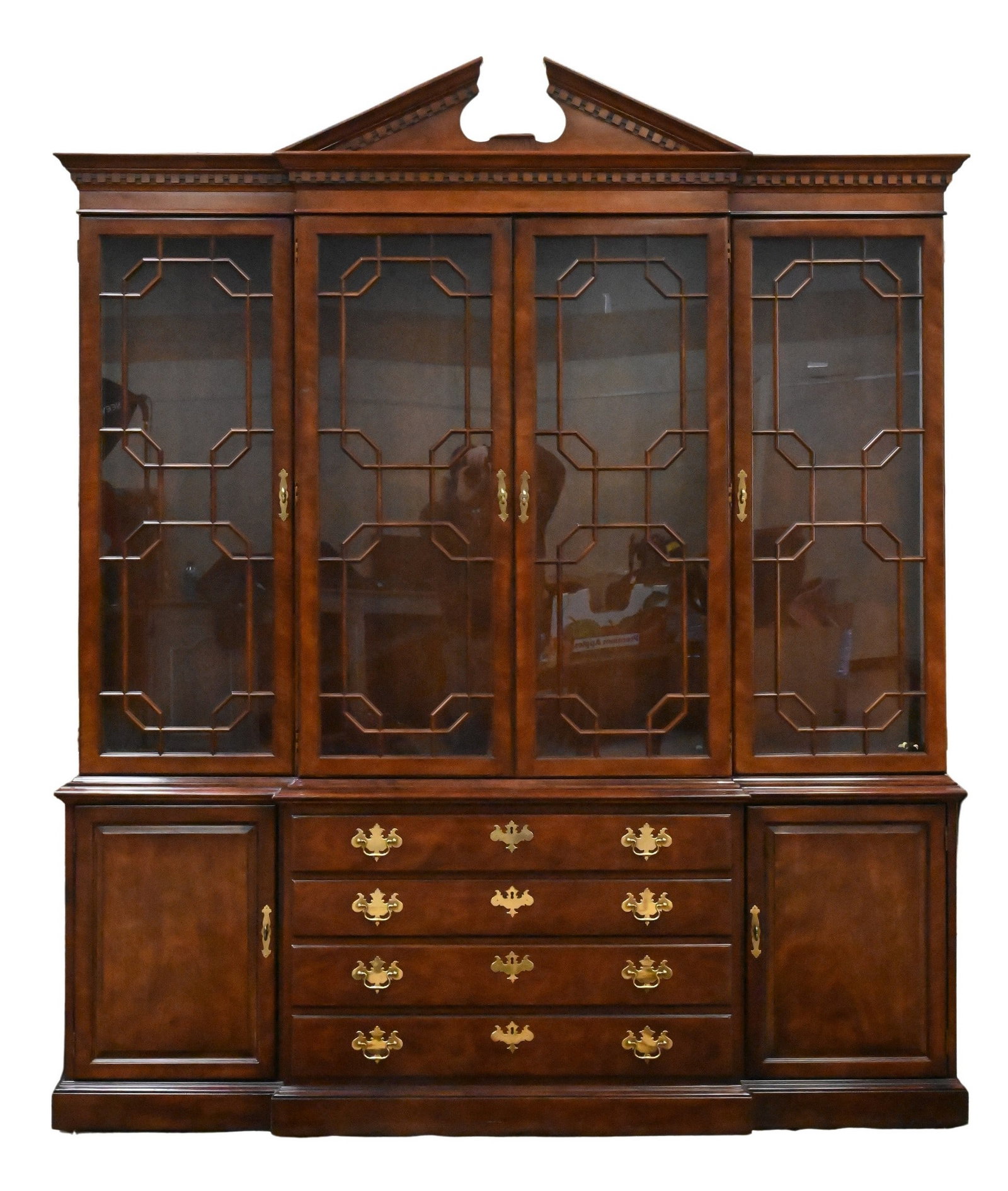 Henredon Georgian Style Breakfront / China Cabinet: Henredon Georgian Style Breakfront / China Cabinet having broken arch top over four lattice front glass doors opening to interior glass shelving set on base having four drawers flanked by two doors