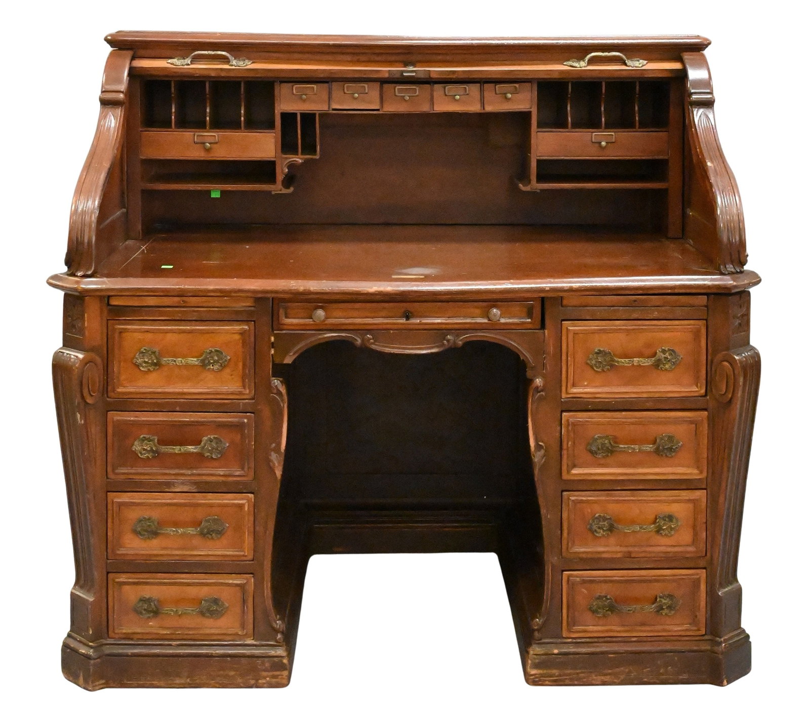 Victorian Rolltop Cylinder Oak Desk: Victorian Rolltop Cylinder Oak Desk having tambour roll top, raised side panels, and eight primary drawers, wear to edges height 46 1/2 inches, width 50 inches, depth 32 inches
