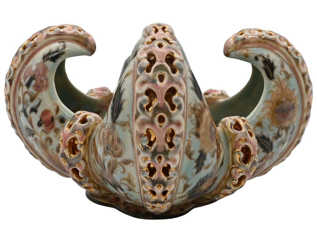 Zsolnay Reticulated Porcelain Center Bowl: Zsolnay Reticulated Porcelain Center Bowl Having a quatrolobed form, pierced and gilt-highlighted rim, the body decorated in polychrome floral motifs on a pale blue ground, mark to underside No.59 