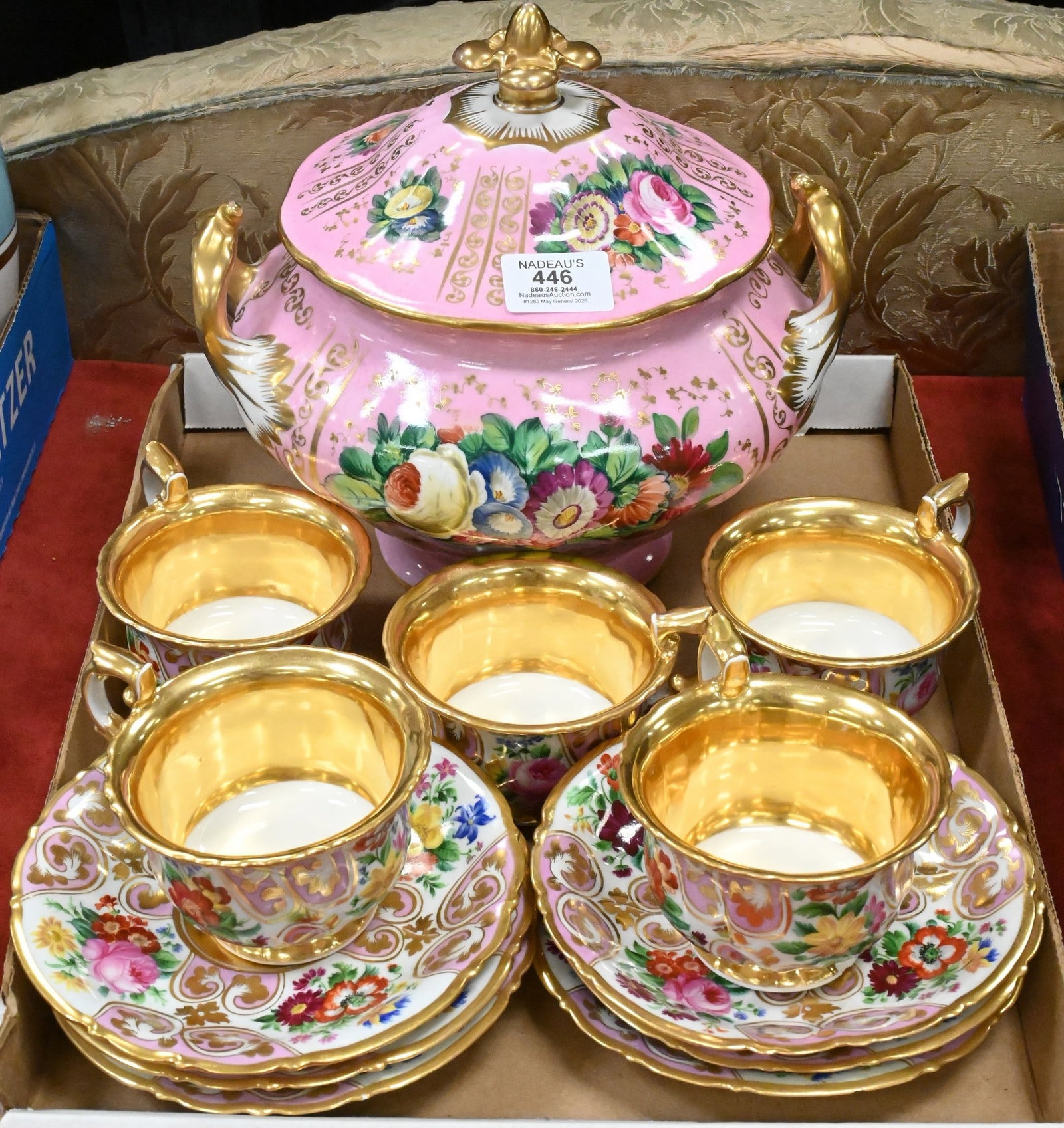 Twelve Piece Vienna Style Porcelain Tea Set: Twelve Piece Vienna Style Porcelain Tea Set Group featuring a double handled tureen, five teacups, six matching saucers, each having polychrome floral decoration on a pink ground, gilt scrollwork