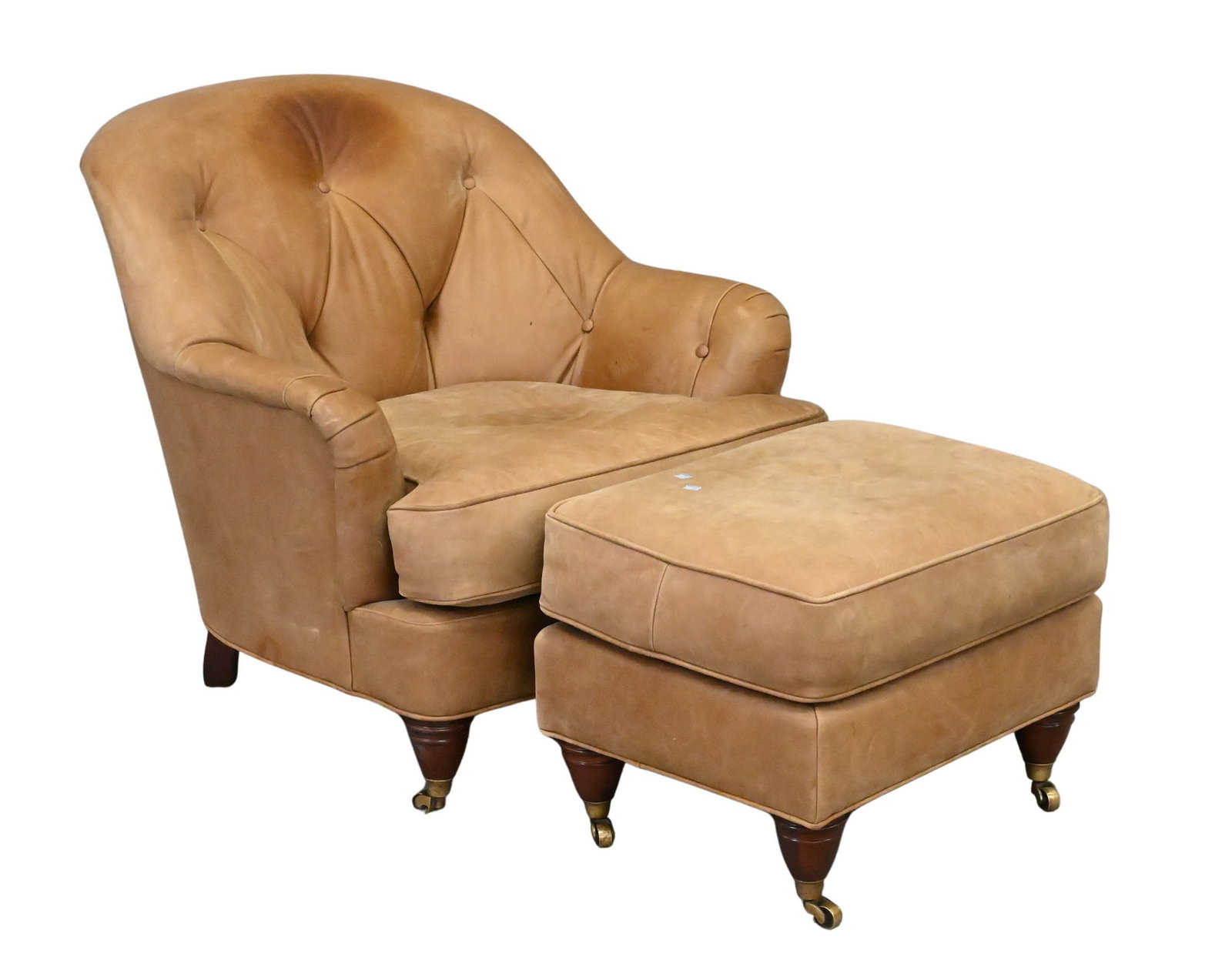 Baker Milling Road Upholstered Lounge Chair and Ottoman: Baker Milling Road Upholstered Lounge Chair and Ottoman tufted suede over brass casters height 34 inches, width 37 inches Provenance: Property from a Upper East Side, New York City Apartment