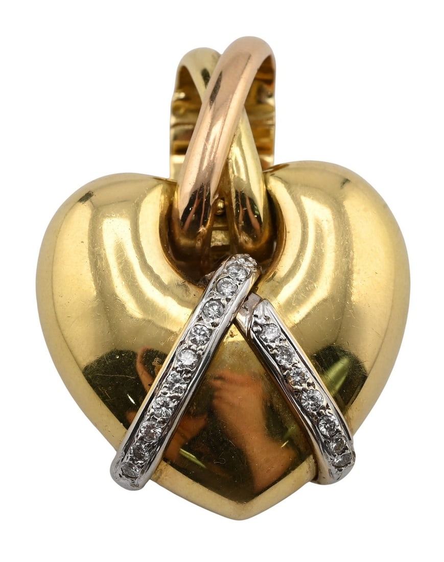 14K Yellow Gold Heart Pendant with Diamond Accent: 14K Yellow Gold Heart Pendant with Diamond Accent Polished 14K yellow gold heart-form pendant suspending two interlocking white gold bands set with small round diamonds. 1" x 1 1/2" total weight 18.7 