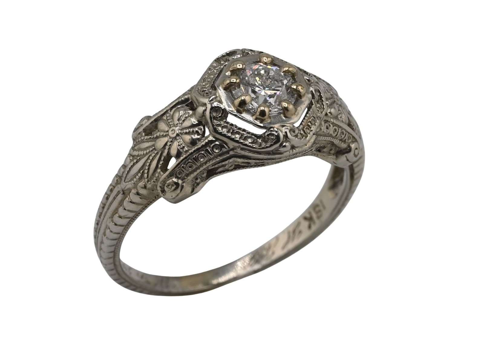 18K White Gold Art Deco Diamond Engagement Ring: 18K White Gold Art Deco Diamond Engagement Ring center stone approx. 3.3mm, set on a floral and milgrain band, size 6, total weight 2.7g.
