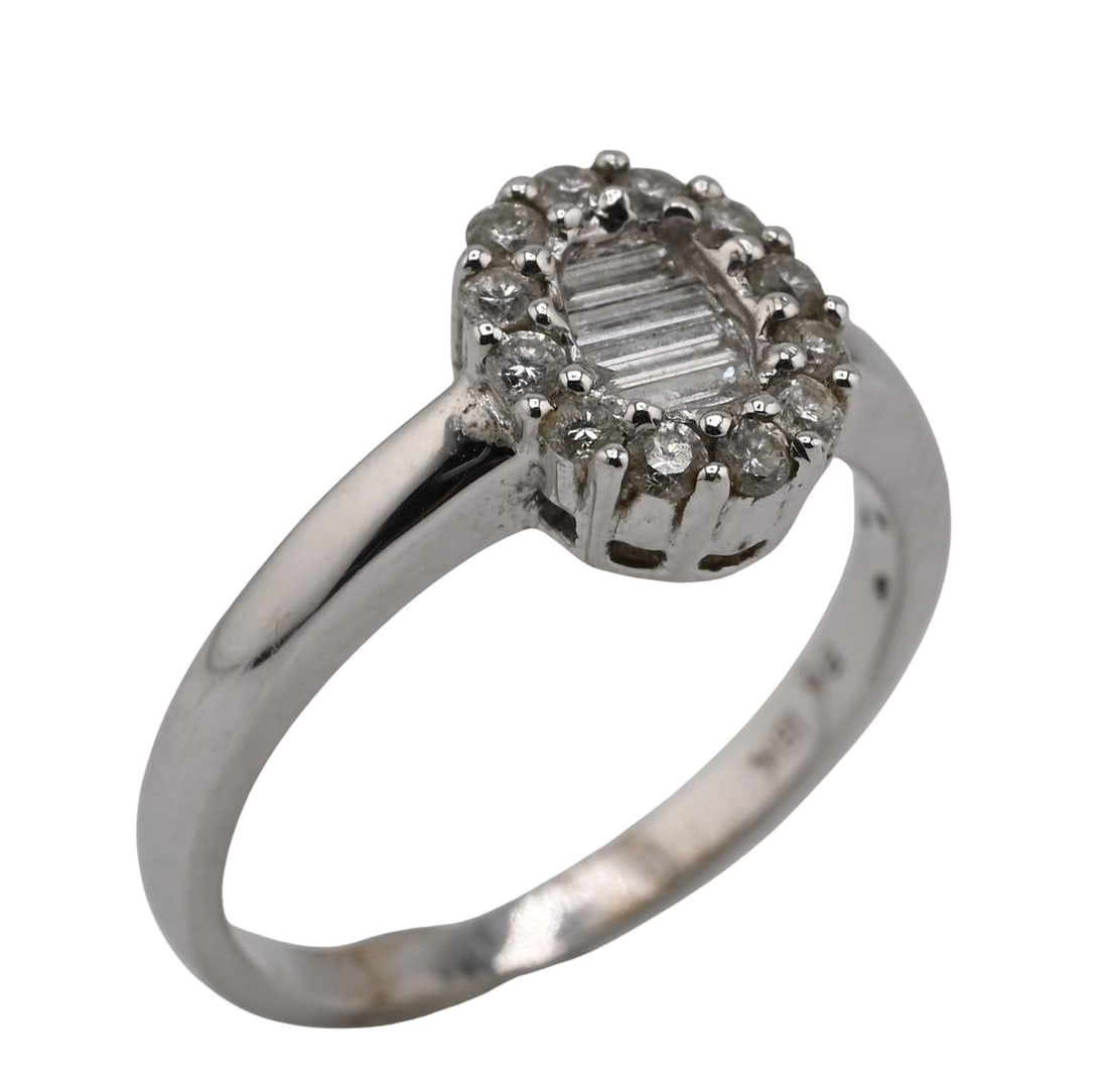 18K White Gold and Diamond RIng: 18K White Gold and Diamond RIng center set with baguette cut diamonds in a halo of smaller round cuts, approx. 0.51ctw., size 6 3/4, total weight 4.0g.