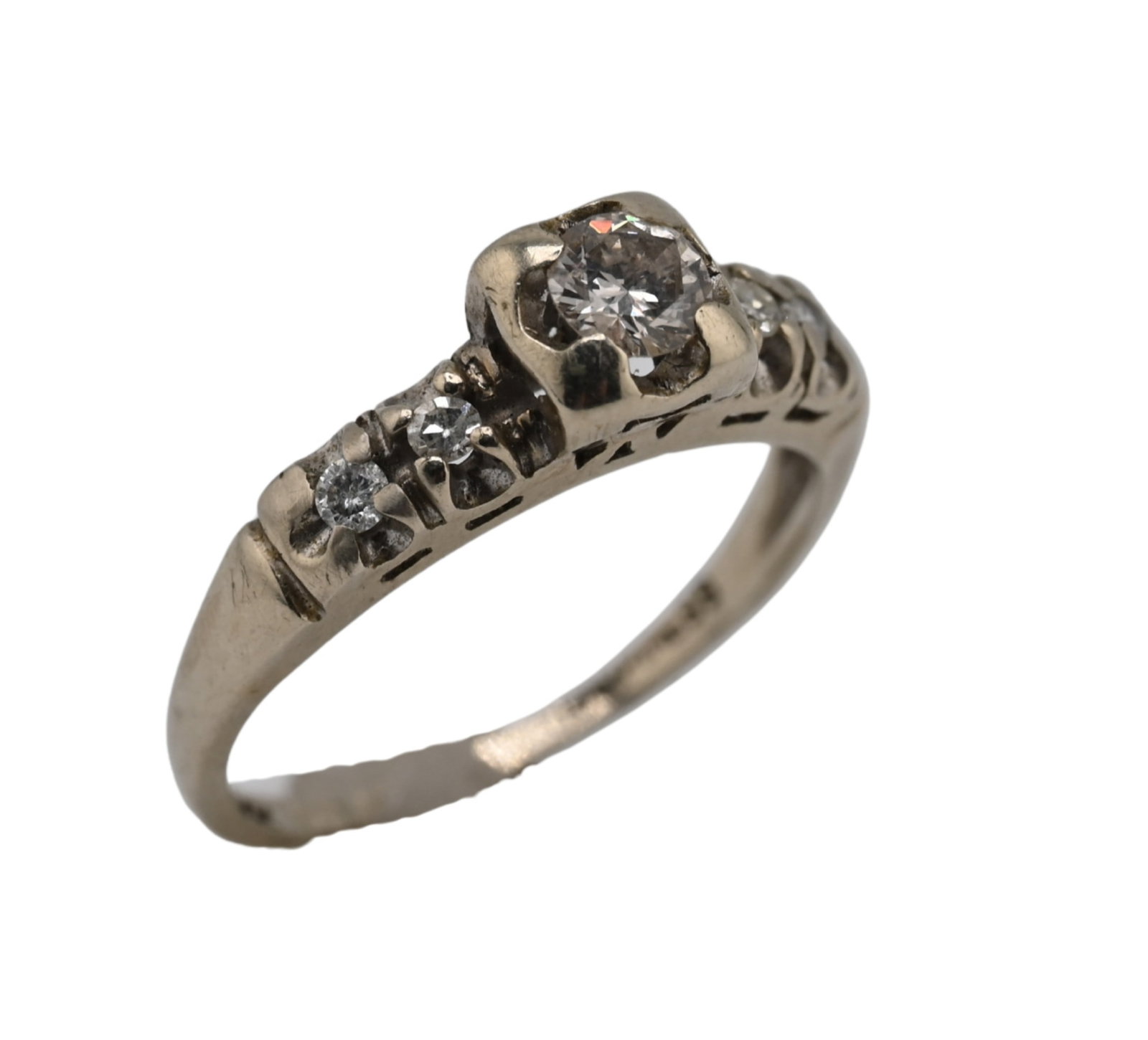 14K White Gold Diamond Engagement Ring: 14K White Gold Diamond Engagement Ring center stone approx. 4.4mm, flanked by smaller round cut diamonds, size 6, total weight 2.2g.