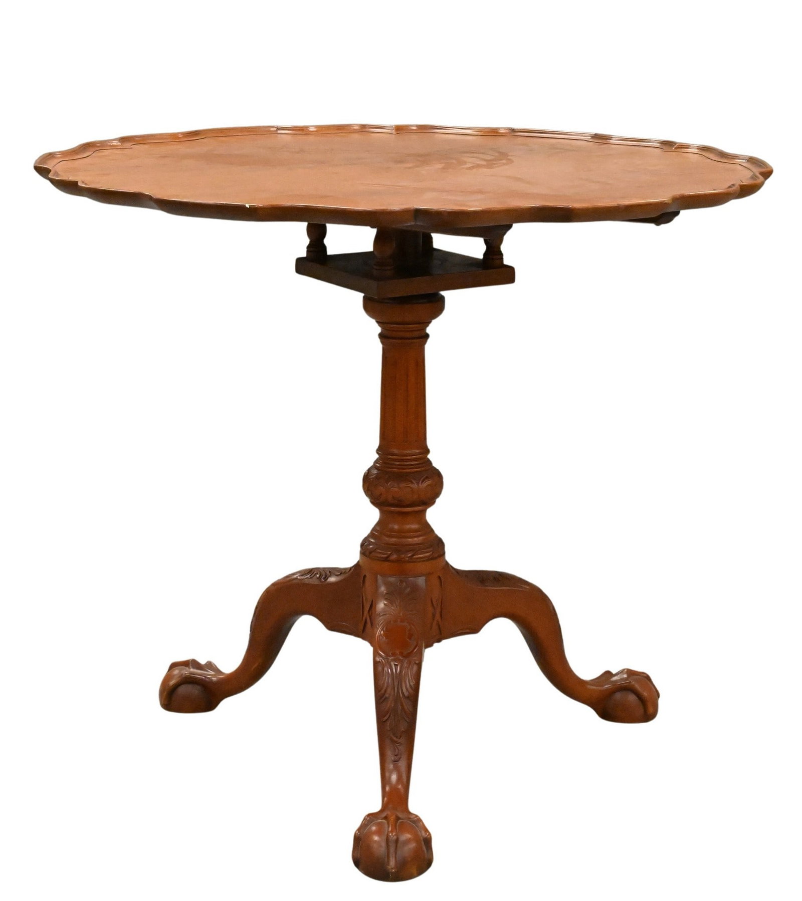 Margolis Mahogany Bench-Made Tip and Turn Tea Table: Margolis Mahogany Bench-Made Tip and Turn Tea Table having pie crust top on fluted and carved shaft, ending with tripod base and ball and claw feet height 29 1/2 inches, diameter 34 inches