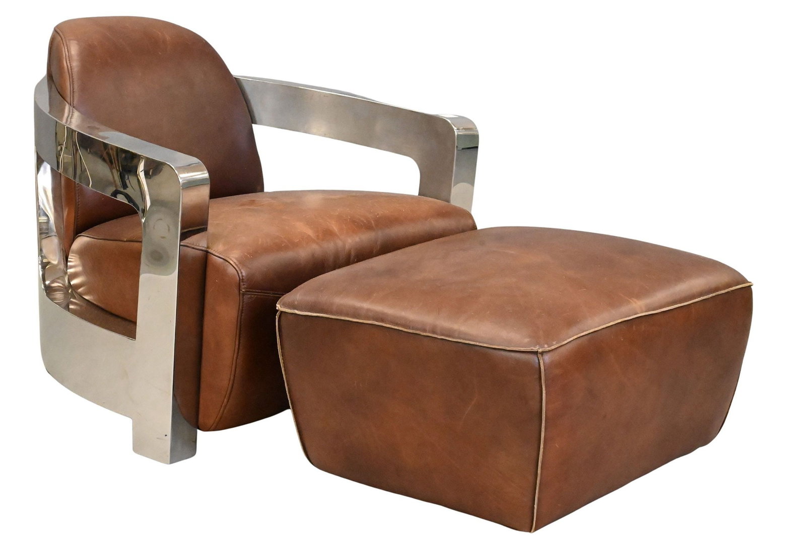 Leather Upholstered Amax "Aviator" Chair and Ottoman: Leather Upholstered Amax "Aviator" Chair and Ottoman having chrome frame height 29 inches, width 33 inches, depth 36 inches