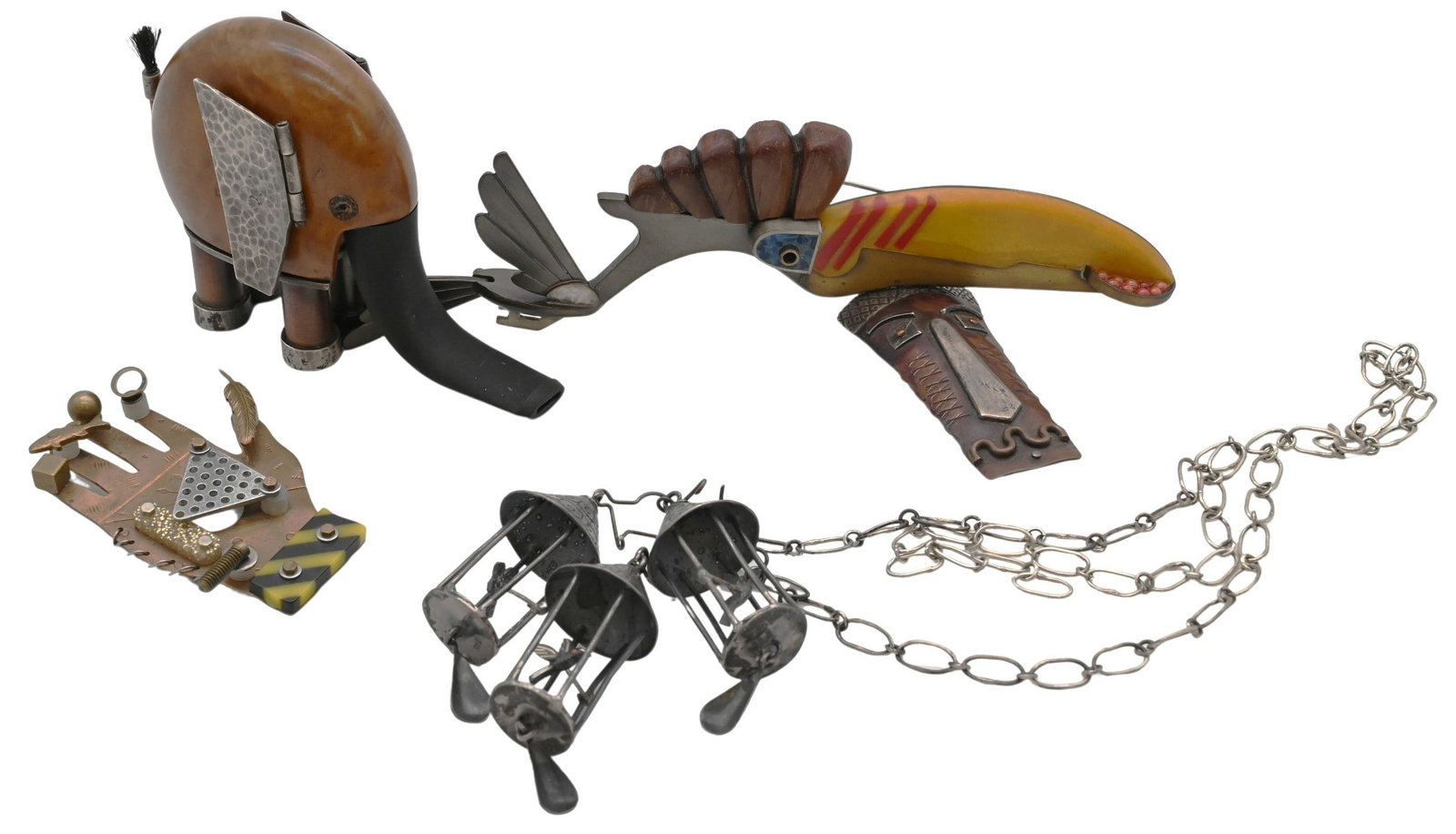 Group of Mixed Metal Studio Jewelry and Objects: Group of Mixed Metal Studio Jewelry and Objects Craftsman and studio-made items including two L&S Cylinder metal pieces, a mixed media toucan brooch (length 6 1/2 inches) and a burl wood vest pocket