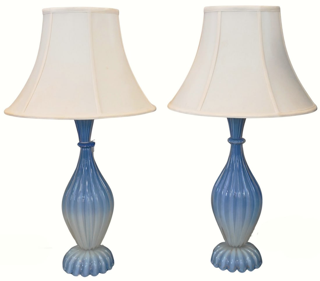 Pair of Mid Century Barovier & Toso Murano Glass Table Lamps: Pair of Mid Century Barovier & Toso Murano Glass Table Lamps each having a baluster-form body featuring vertical ribbing and a flared, scalloped foot, executed in gradient opalescent blue glass