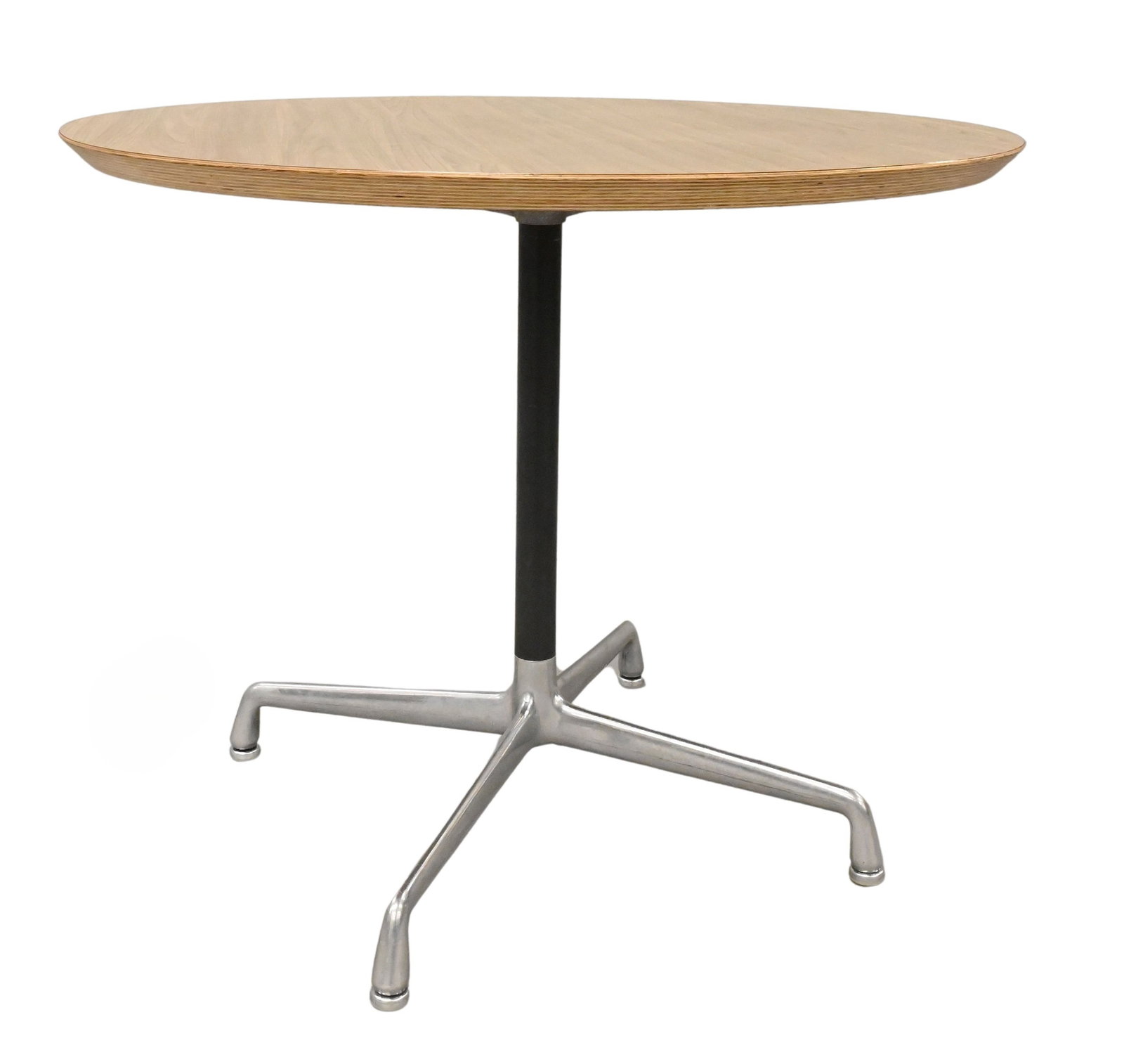 Charles and Ray Eames for Herman Miller Round Table: Charles and Ray Eames for Herman Miller Round Table having aluminum segmented base Bearing Herman Miller tag to underside height 28 1/2 inches, diameter 36 inches Reference: Current comparable example