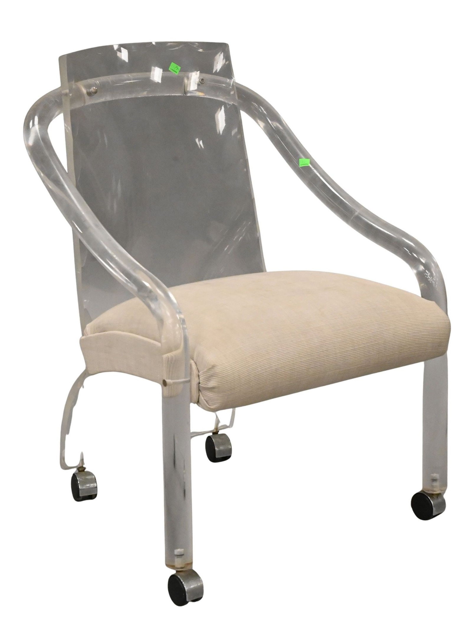 Mid Century Modern Upholstered Lucite Armchair: Mid Century Modern Upholstered Lucite Armchair having curved body, set on casters height 34 inches, width 23 inches