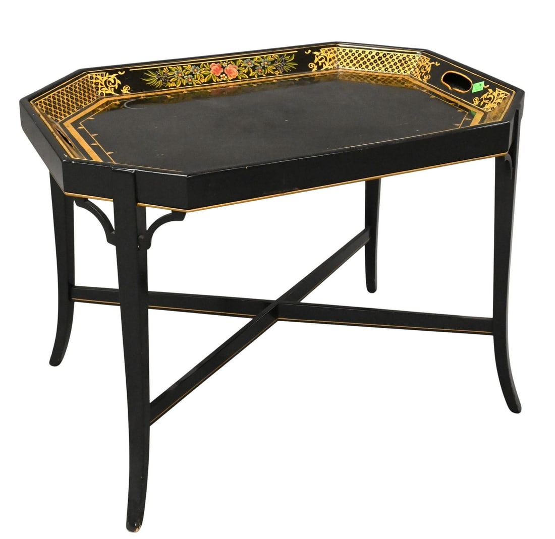 Chinoiserie Black Lacquer Tray Table: Chinoiserie Black Lacquer Tray Table Octagonal tray top having gilt and polychrome floral decoration, lattice panels, and inset handles, raised on cross bar supports height 19 1/2 inches, top 19" x