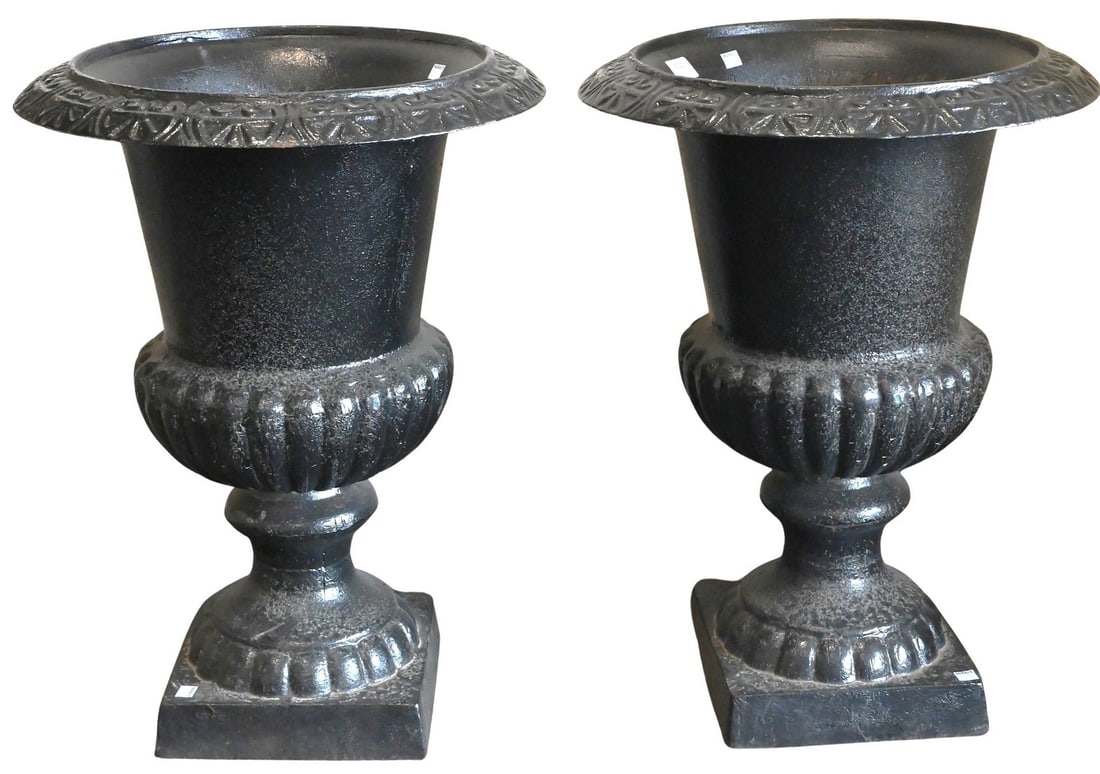 Pair of Victorian Outdoor Cast Iron Urns: Pair of Victorian Outdoor Cast Iron Urns each having flared rims height 25 inches, diameter 19 inches
